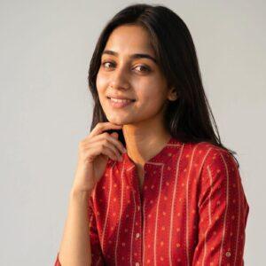 Ruby red floral printed top for women featuring elegant botanical motifs and a modern fit.
